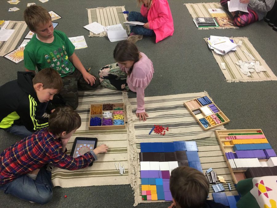 students playing on floor